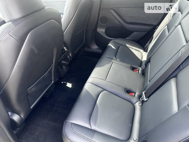 Серый Тесла Model Y, объемом двигателя 0 л и пробегом 31 тыс. км за 26500 $, фото 19 на Automoto.ua