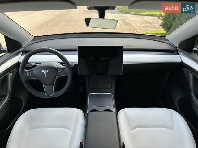 Серый Тесла Model Y, объемом двигателя 0 л и пробегом 55 тыс. км за 29500 $, фото 11 на Automoto.ua