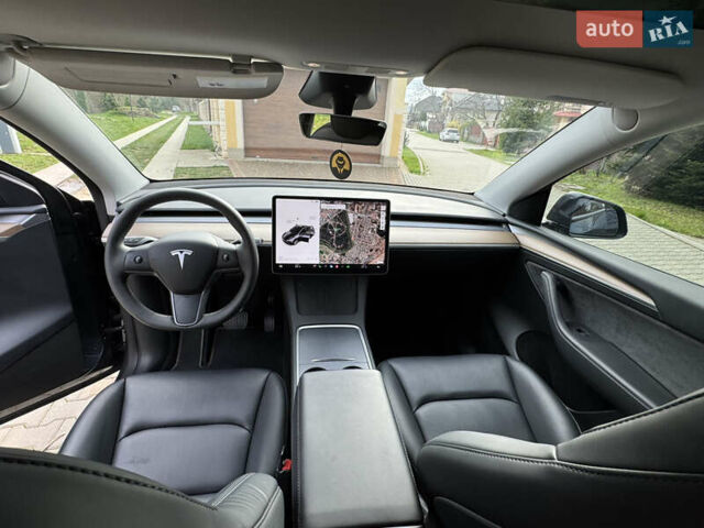 Серый Тесла Model Y, объемом двигателя 0 л и пробегом 25 тыс. км за 27100 $, фото 8 на Automoto.ua
