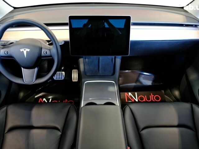 Серый Тесла Model Y, объемом двигателя 0 л и пробегом 42 тыс. км за 23900 $, фото 6 на Automoto.ua