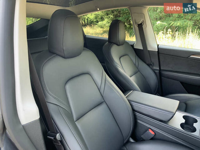 Серый Тесла Model Y, объемом двигателя 0 л и пробегом 47 тыс. км за 28028 $, фото 28 на Automoto.ua