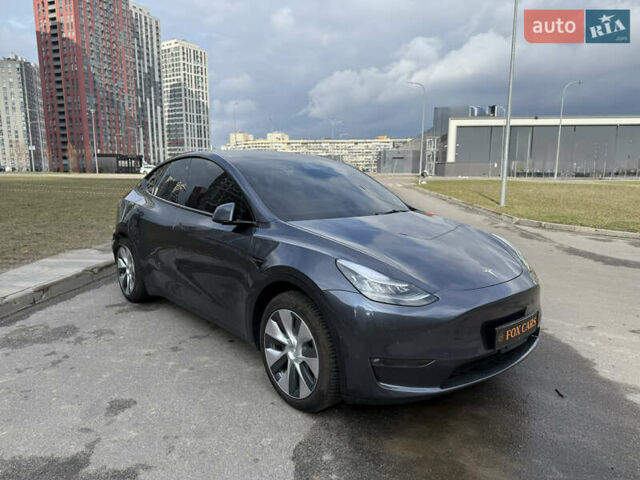 Серый Тесла Model Y, объемом двигателя 0 л и пробегом 31 тыс. км за 26999 $, фото 2 на Automoto.ua
