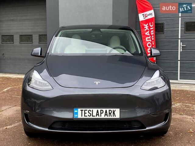 Сірий Тесла Model Y, об'ємом двигуна 0 л та пробігом 51 тис. км за 33999 $, фото 2 на Automoto.ua