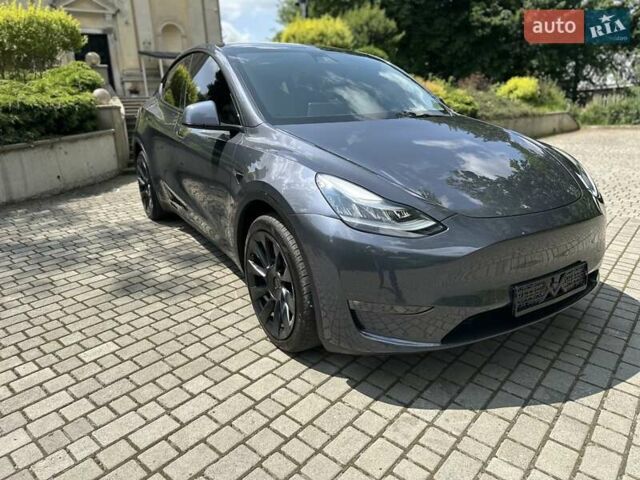 Серый Тесла Model Y, объемом двигателя 0 л и пробегом 55 тыс. км за 25100 $, фото 1 на Automoto.ua