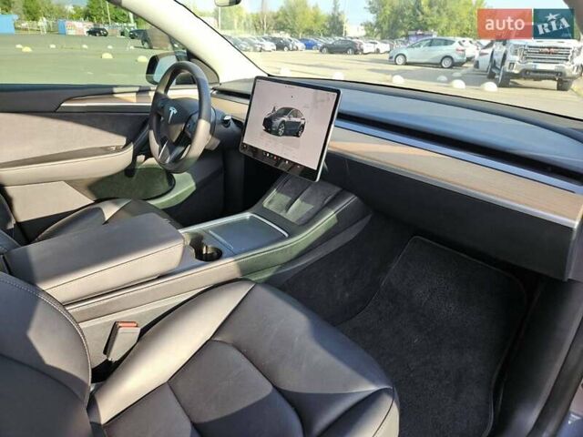 Серый Тесла Model Y, объемом двигателя 0 л и пробегом 34 тыс. км за 28300 $, фото 25 на Automoto.ua