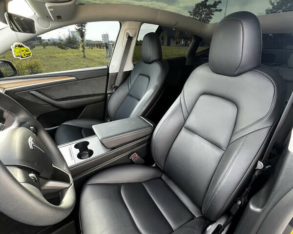 Серый Тесла Model Y, объемом двигателя 0 л и пробегом 19 тыс. км за 25800 $, фото 16 на Automoto.ua