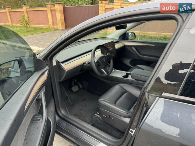 Серый Тесла Model Y, объемом двигателя 0 л и пробегом 57 тыс. км за 31333 $, фото 3 на Automoto.ua