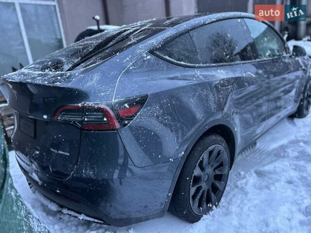 Серый Тесла Model Y, объемом двигателя 0 л и пробегом 26 тыс. км за 18900 $, фото 2 на Automoto.ua
