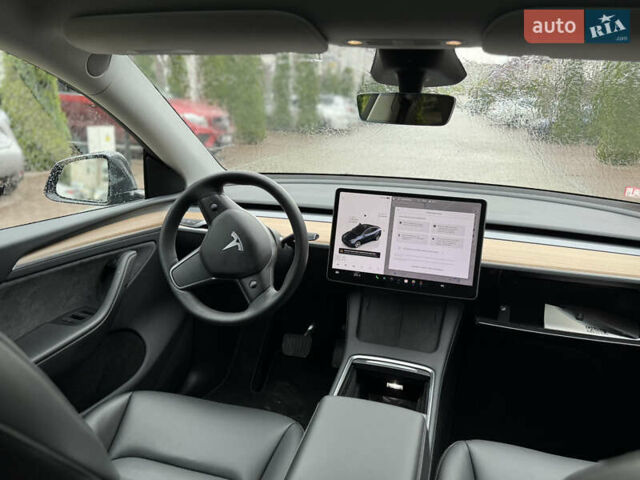 Серый Тесла Model Y, объемом двигателя 0 л и пробегом 18 тыс. км за 28500 $, фото 6 на Automoto.ua