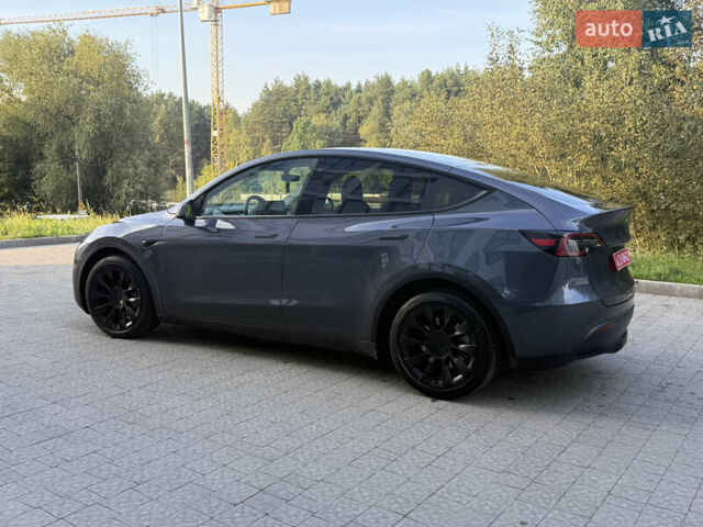 Серый Тесла Model Y, объемом двигателя 0 л и пробегом 49 тыс. км за 27000 $, фото 4 на Automoto.ua
