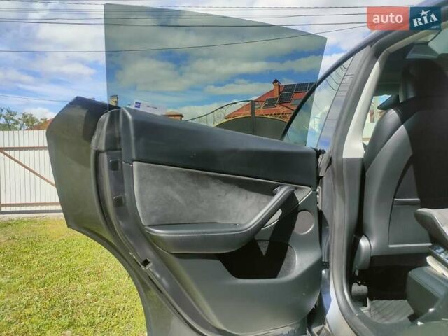 Серый Тесла Model Y, объемом двигателя 0 л и пробегом 30 тыс. км за 32350 $, фото 58 на Automoto.ua