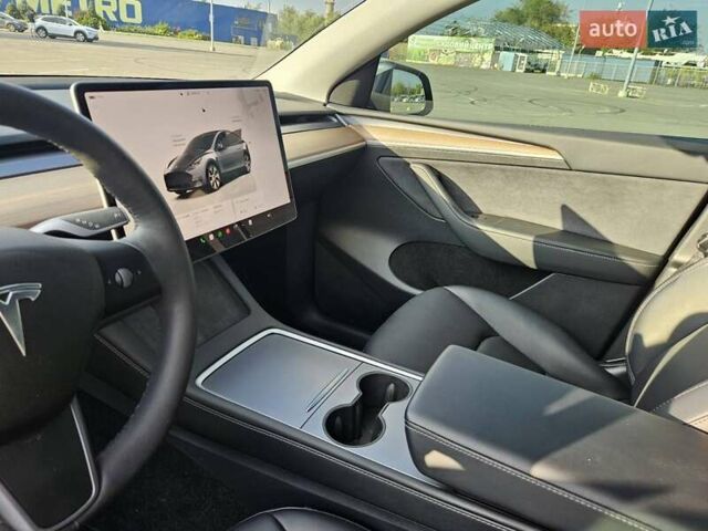 Серый Тесла Model Y, объемом двигателя 0 л и пробегом 34 тыс. км за 28300 $, фото 18 на Automoto.ua