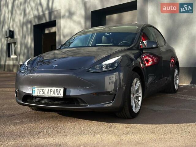 Сірий Тесла Model Y, об'ємом двигуна 0 л та пробігом 27 тис. км за 28999 $, фото 2 на Automoto.ua