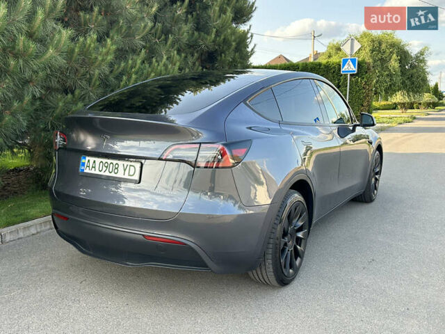 Серый Тесла Model Y, объемом двигателя 0 л и пробегом 55 тыс. км за 29500 $, фото 4 на Automoto.ua