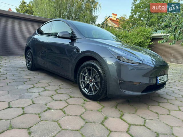 Серый Тесла Model Y, объемом двигателя 0 л и пробегом 24 тыс. км за 26400 $, фото 2 на Automoto.ua