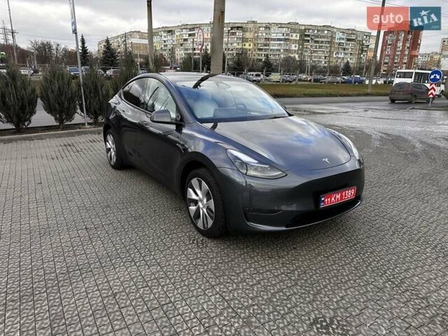 Серый Тесла Model Y, объемом двигателя 0 л и пробегом 24 тыс. км за 28399 $, фото 5 на Automoto.ua