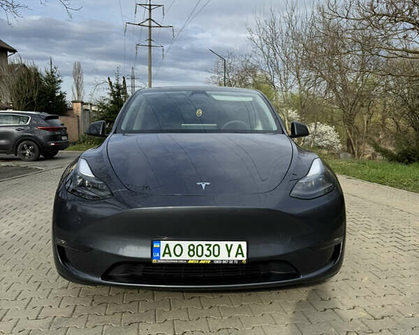 Серый Тесла Model Y, объемом двигателя 0 л и пробегом 25 тыс. км за 27100 $, фото 1 на Automoto.ua