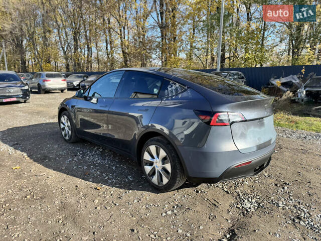 Серый Тесла Model Y, объемом двигателя 0 л и пробегом 22 тыс. км за 21900 $, фото 5 на Automoto.ua