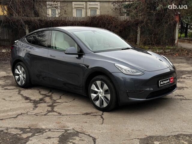 Серый Тесла Model Y, объемом двигателя 0 л и пробегом 22 тыс. км за 25990 $, фото 2 на Automoto.ua