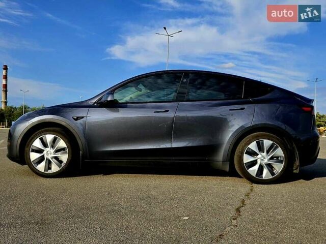 Серый Тесла Model Y, объемом двигателя 0 л и пробегом 34 тыс. км за 28300 $, фото 3 на Automoto.ua