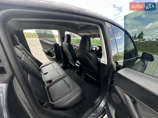 Серый Тесла Model Y, объемом двигателя 0 л и пробегом 9 тыс. км за 28950 $, фото 21 на Automoto.ua