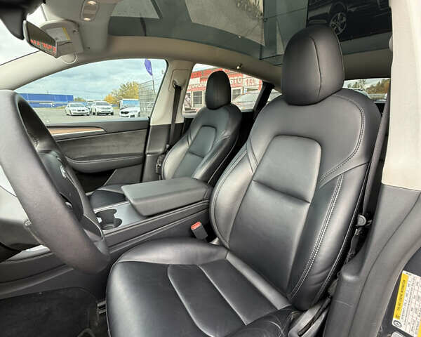 Серый Тесла Model Y, объемом двигателя 0 л и пробегом 71 тыс. км за 28900 $, фото 11 на Automoto.ua