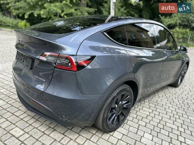 Серый Тесла Model Y, объемом двигателя 0 л и пробегом 55 тыс. км за 25100 $, фото 25 на Automoto.ua