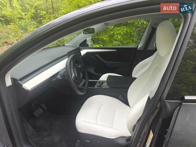 Серый Тесла Model Y, объемом двигателя 0 л и пробегом 17 тыс. км за 28777 $, фото 28 на Automoto.ua