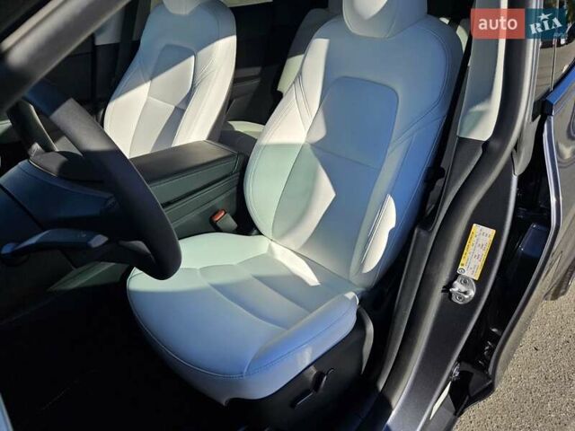 Серый Тесла Model Y, объемом двигателя 0 л и пробегом 29 тыс. км за 27900 $, фото 22 на Automoto.ua