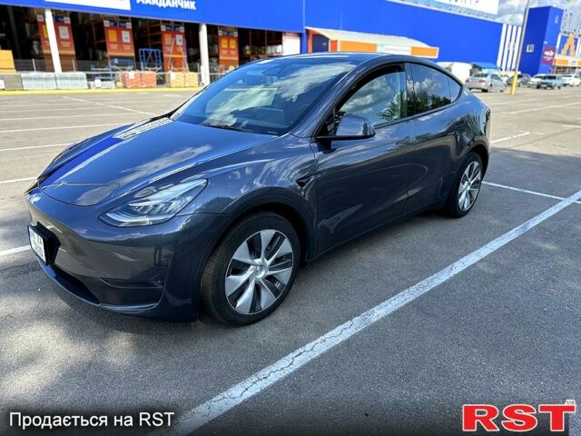 Серый Тесла Model Y, объемом двигателя 0 л и пробегом 13 тыс. км за 28650 $, фото 2 на Automoto.ua