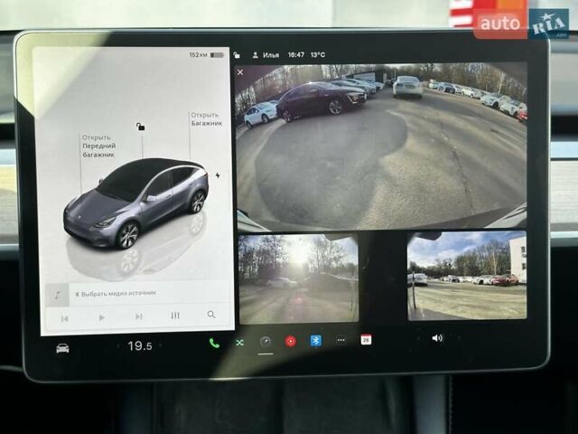 Сірий Тесла Model Y, об'ємом двигуна 0 л та пробігом 27 тис. км за 28999 $, фото 21 на Automoto.ua