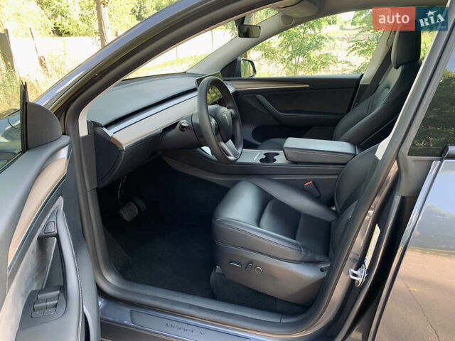 Серый Тесла Model Y, объемом двигателя 0 л и пробегом 47 тыс. км за 28028 $, фото 18 на Automoto.ua