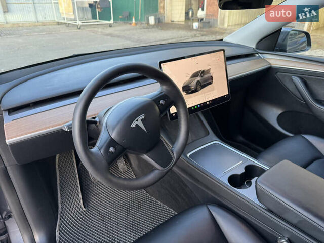 Серый Тесла Model Y, объемом двигателя 0 л и пробегом 24 тыс. км за 26400 $, фото 13 на Automoto.ua