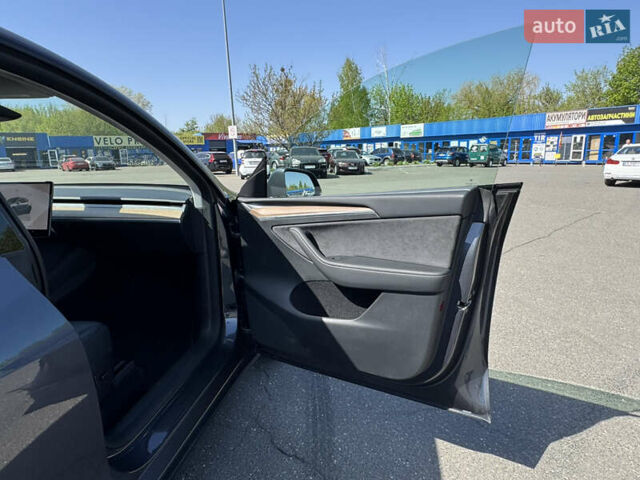 Серый Тесла Model Y, объемом двигателя 0 л и пробегом 28 тыс. км за 29000 $, фото 39 на Automoto.ua