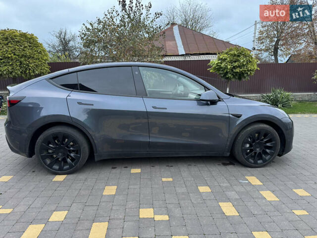 Серый Тесла Model Y, объемом двигателя 0 л и пробегом 74 тыс. км за 26500 $, фото 7 на Automoto.ua