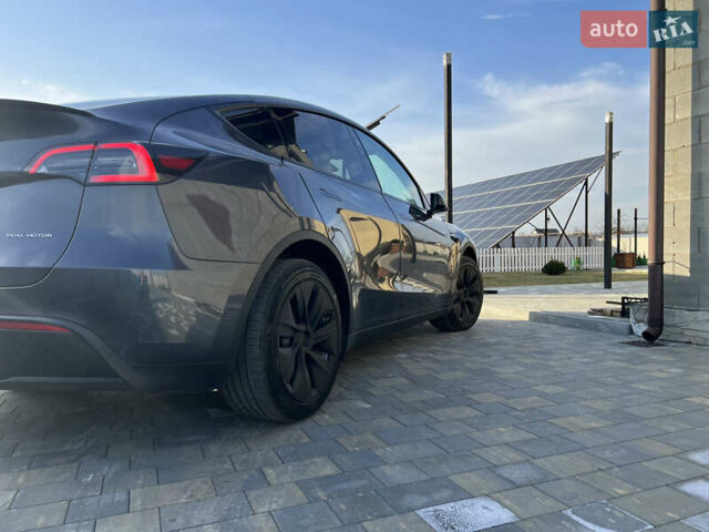Серый Тесла Model Y, объемом двигателя 0 л и пробегом 25 тыс. км за 29000 $, фото 2 на Automoto.ua