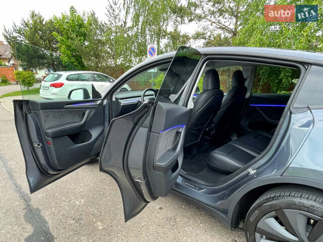 Серый Тесла Model Y, объемом двигателя 0 л и пробегом 19 тыс. км за 33700 $, фото 20 на Automoto.ua