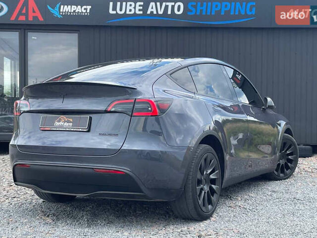 Серый Тесла Model Y, объемом двигателя 0 л и пробегом 41 тыс. км за 27500 $, фото 4 на Automoto.ua