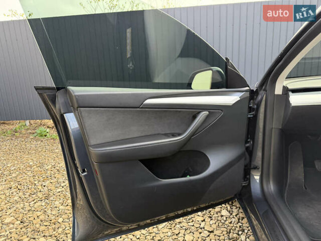 Сірий Тесла Model Y, об'ємом двигуна 0 л та пробігом 28 тис. км за 27900 $, фото 36 на Automoto.ua