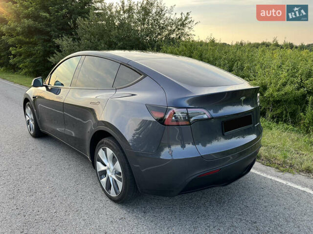 Серый Тесла Model Y, объемом двигателя 0 л и пробегом 27 тыс. км за 28900 $, фото 5 на Automoto.ua