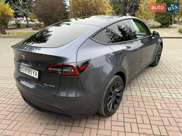 Серый Тесла Model Y, объемом двигателя 0 л и пробегом 60 тыс. км за 29000 $, фото 1 на Automoto.ua