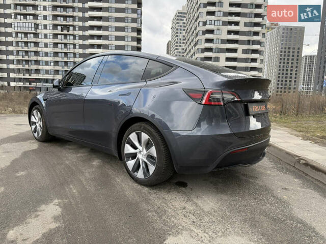 Серый Тесла Model Y, объемом двигателя 0 л и пробегом 31 тыс. км за 26999 $, фото 4 на Automoto.ua
