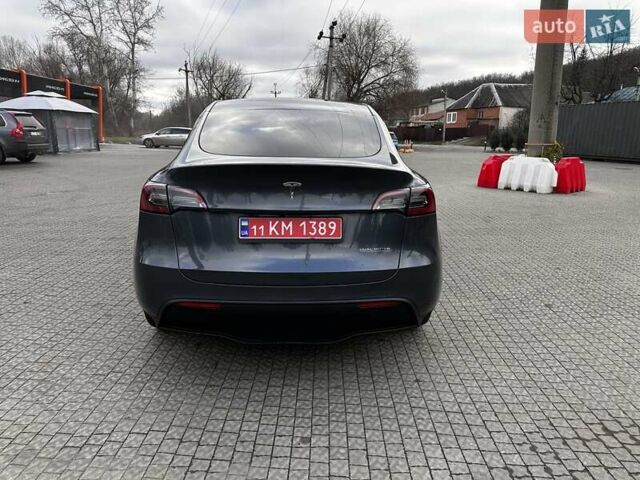 Серый Тесла Model Y, объемом двигателя 0 л и пробегом 24 тыс. км за 28399 $, фото 7 на Automoto.ua