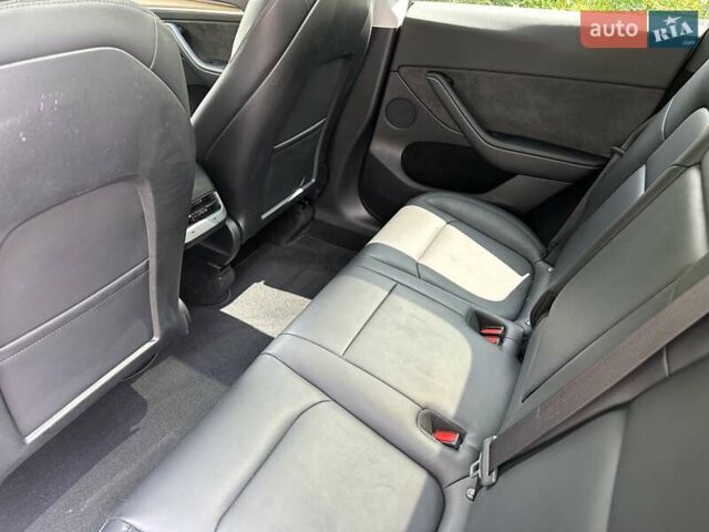 Серый Тесла Model Y, объемом двигателя 0 л и пробегом 55 тыс. км за 25100 $, фото 35 на Automoto.ua