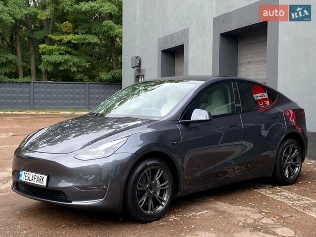 Сірий Тесла Model Y, об'ємом двигуна 0 л та пробігом 51 тис. км за 33999 $, фото 3 на Automoto.ua