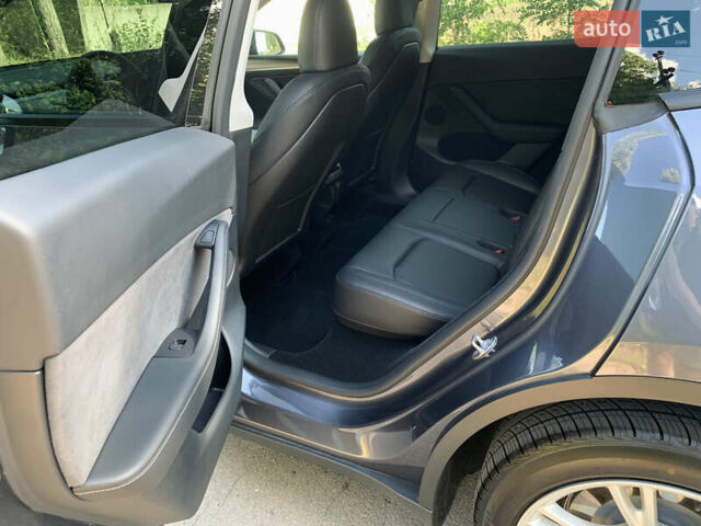 Серый Тесла Model Y, объемом двигателя 0 л и пробегом 47 тыс. км за 28028 $, фото 23 на Automoto.ua
