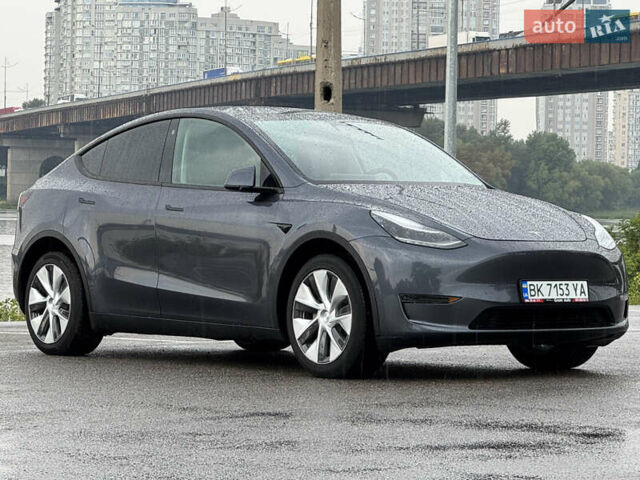 Серый Тесла Model Y, объемом двигателя 0 л и пробегом 66 тыс. км за 27900 $, фото 5 на Automoto.ua