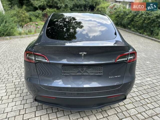 Серый Тесла Model Y, объемом двигателя 0 л и пробегом 55 тыс. км за 25100 $, фото 30 на Automoto.ua