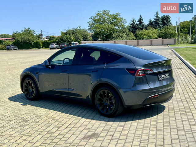 Сірий Тесла Model Y, об'ємом двигуна 0 л та пробігом 45 тис. км за 23300 $, фото 50 на Automoto.ua