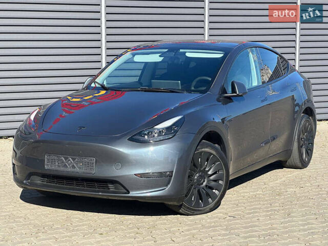 Серый Тесла Model Y, объемом двигателя 0 л и пробегом 93 тыс. км за 27900 $, фото 1 на Automoto.ua